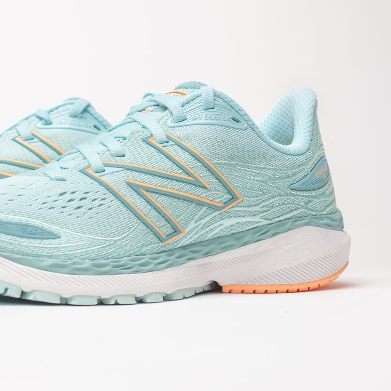 Zoomed in, side profile of light blue Fresh Foam X 860v12 with front upper cropped