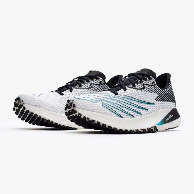 Left and right running shoe sitting on a grey background.