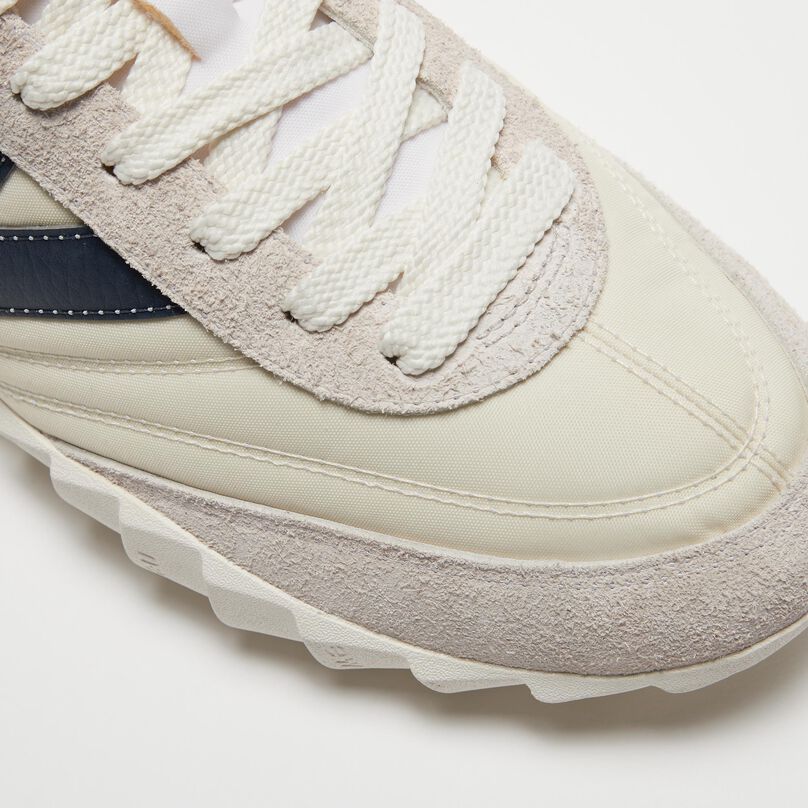 Top-down detail of the toe-box for the white RC30 showing the hairy suede and nylon upper.
