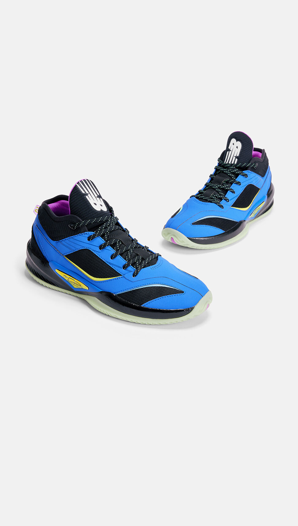 A studio shot of a blue and black KAWHI III shoe.