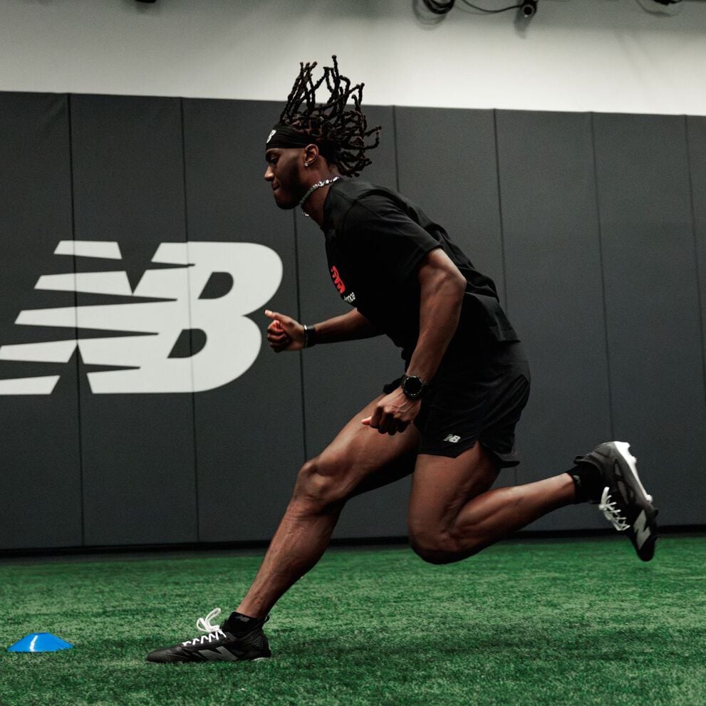 Marvin Harrison Jr running on turf.