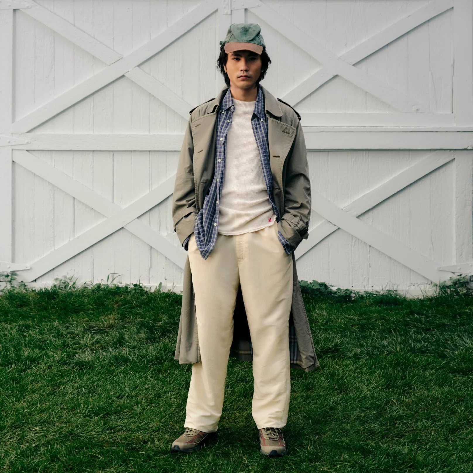 A person wearing Made in USA apparel and 990v6 shoes.