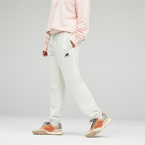 Leg shot of woman wearing off white joggers 
