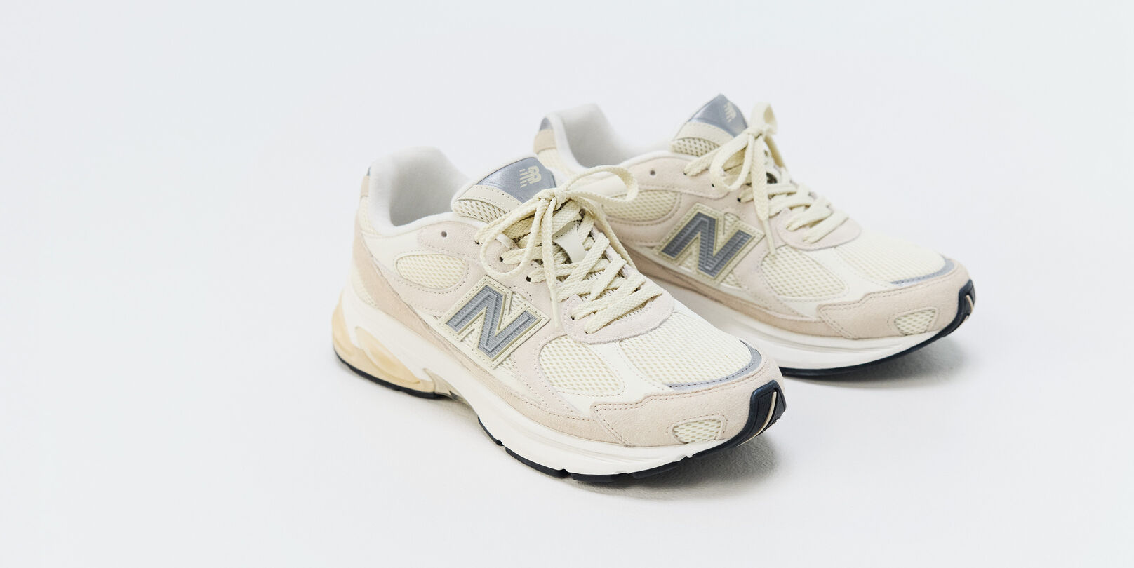 A pair of New Balance sneakers on a white background 