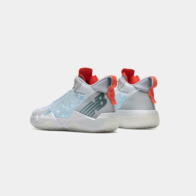 Pair of the silver shoes focusing on the heel.