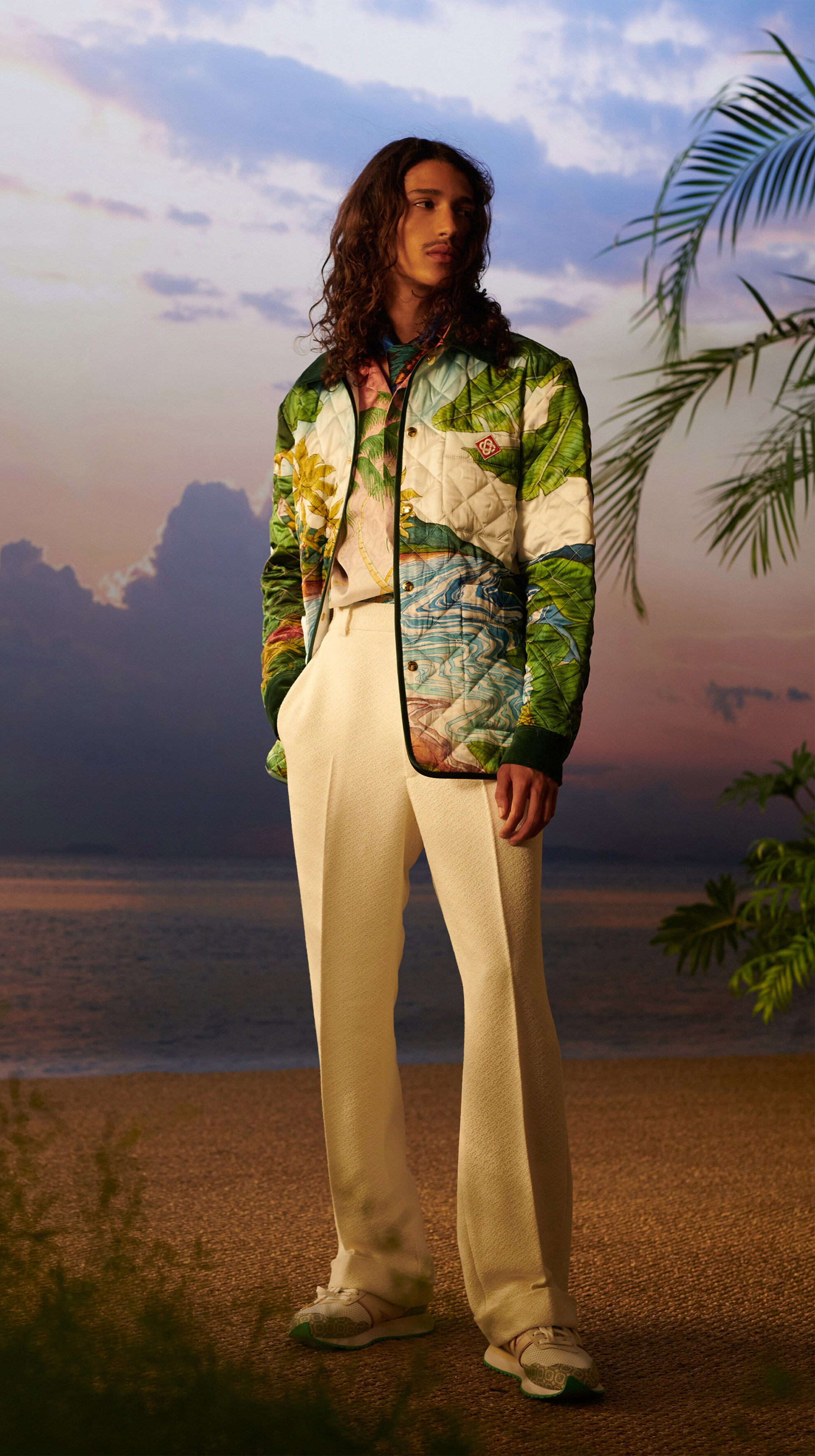 Four images on 2 young men showing off the colorful apparel.