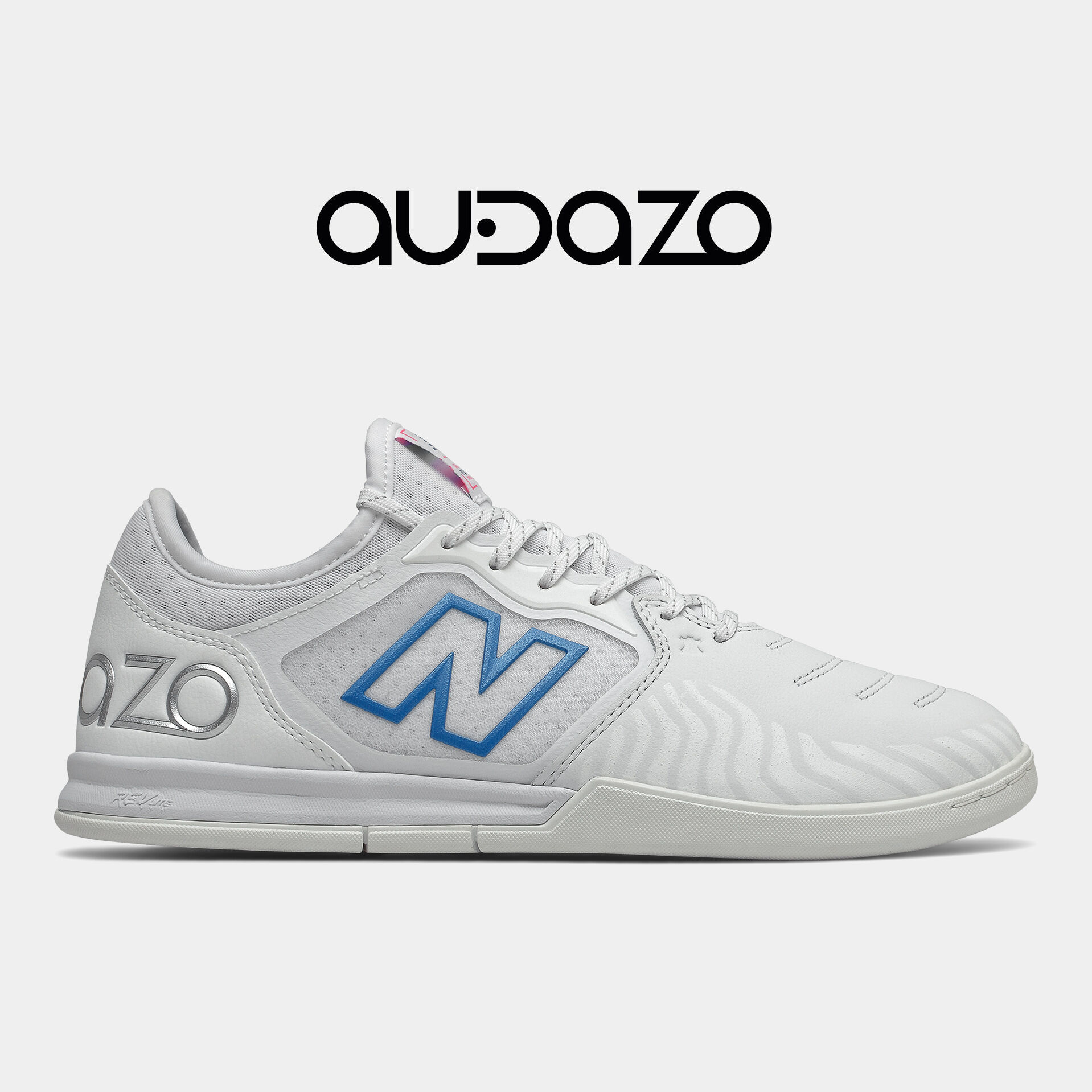 White indoor soccer shoe.