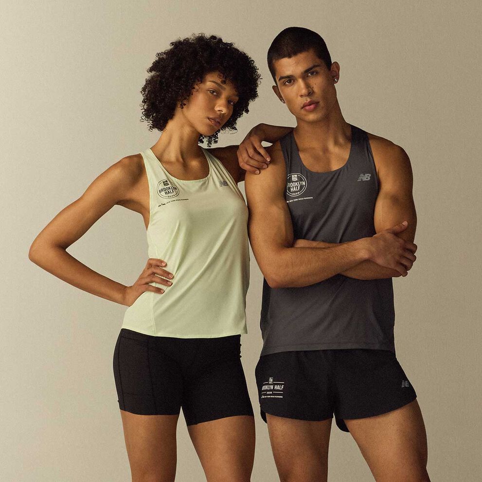 Two people wearing RBC Brooklyn Half apparel. 