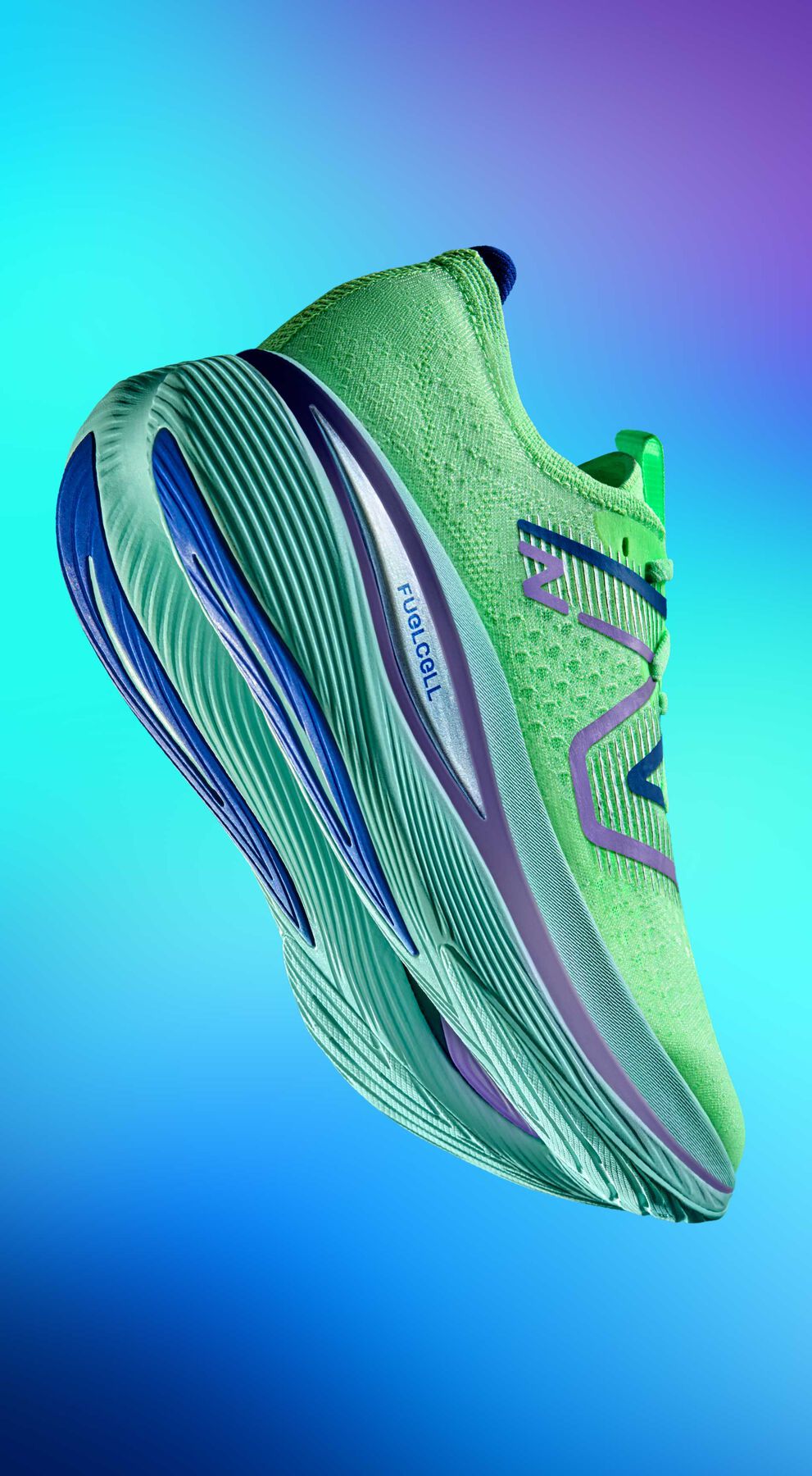 Womens Fuelcell SuperComp Trainer v1 shoe floating with blue gradient background