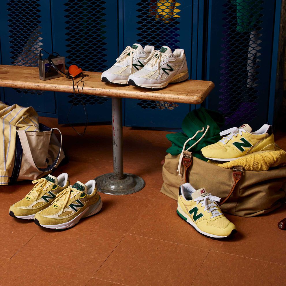A grouping of New Balance MADE in USA sneakers: A yellow 990v6 & 99996 and white 990v4 sneakers. 
