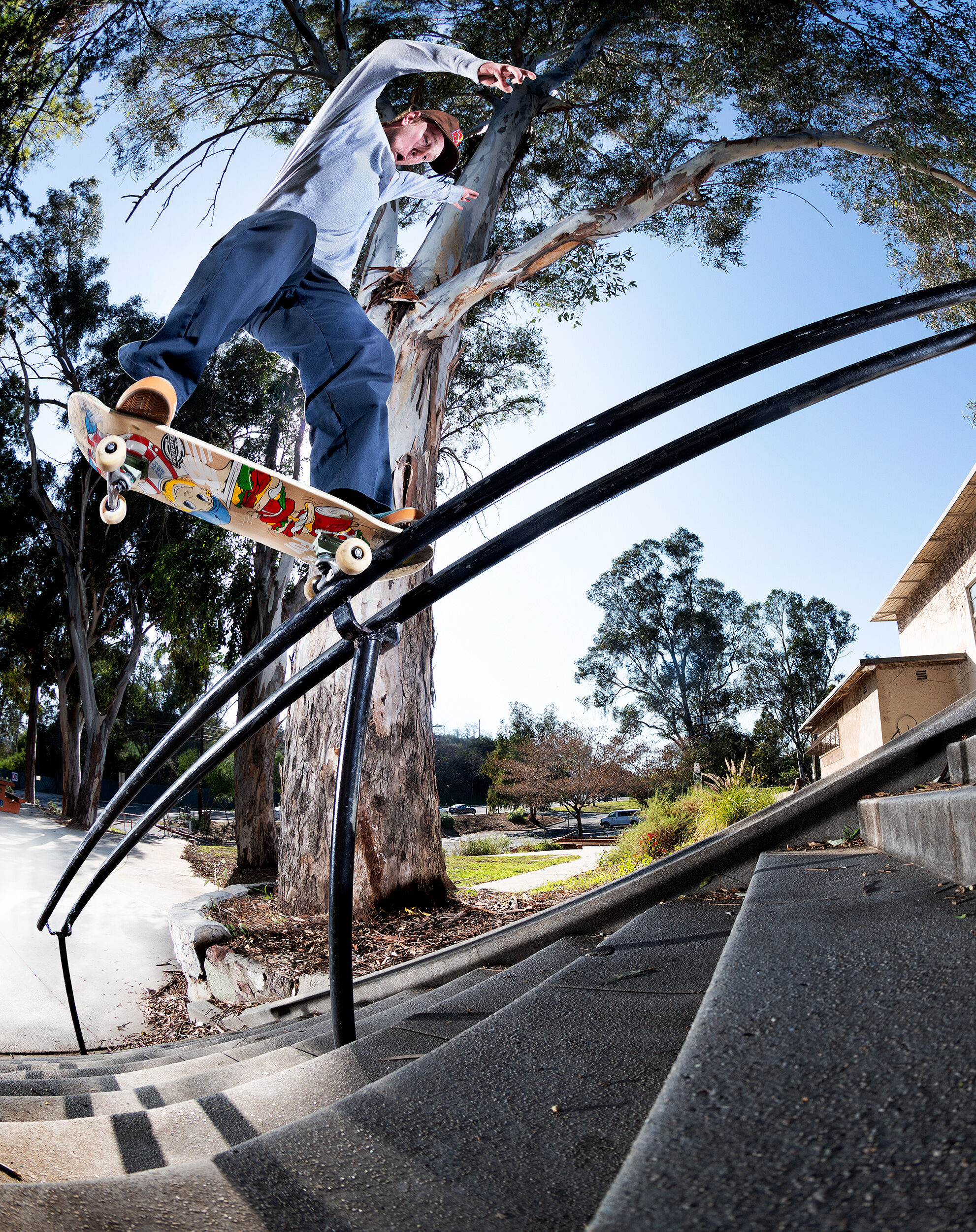 Jamie Foy riding a rail down the steps.