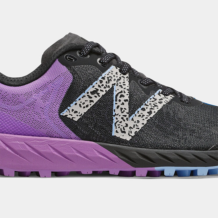 Profile angle of the trail shoe focusing on the outsole.