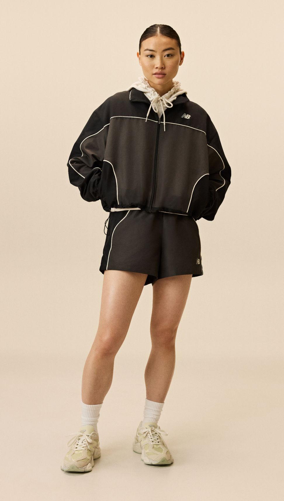 A person wearing 9060 shoes. 