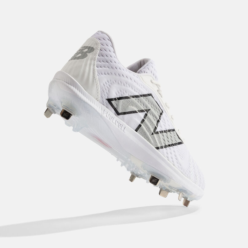 Floating white cleat showing the spike plate.