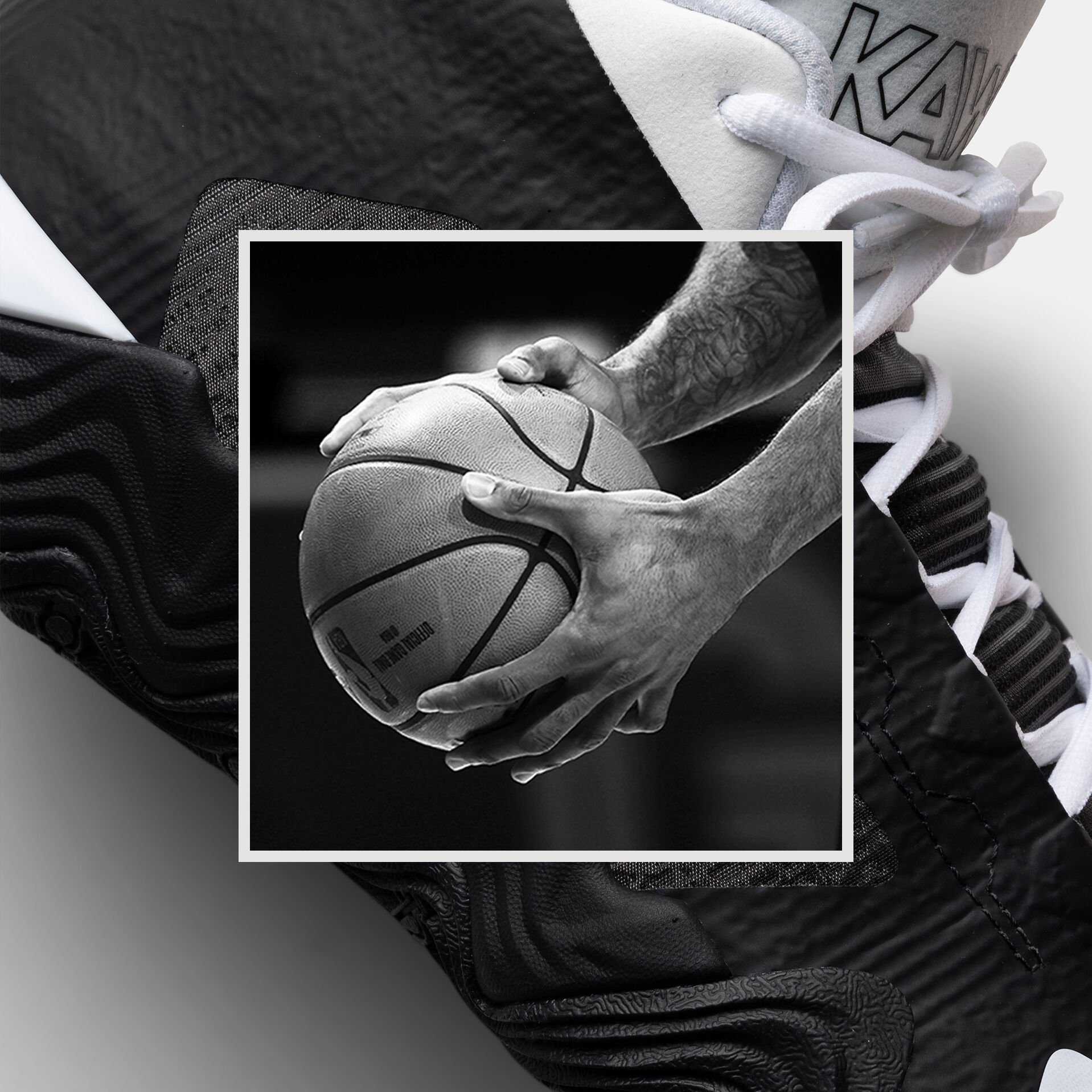 Hands holding a basketball over a detail shot of a white basketball shoe.