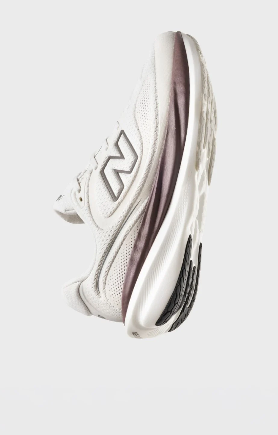 One 1080 shoe on a grey background.