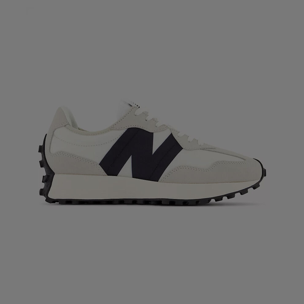 Black, white, and grey New Balance 327.