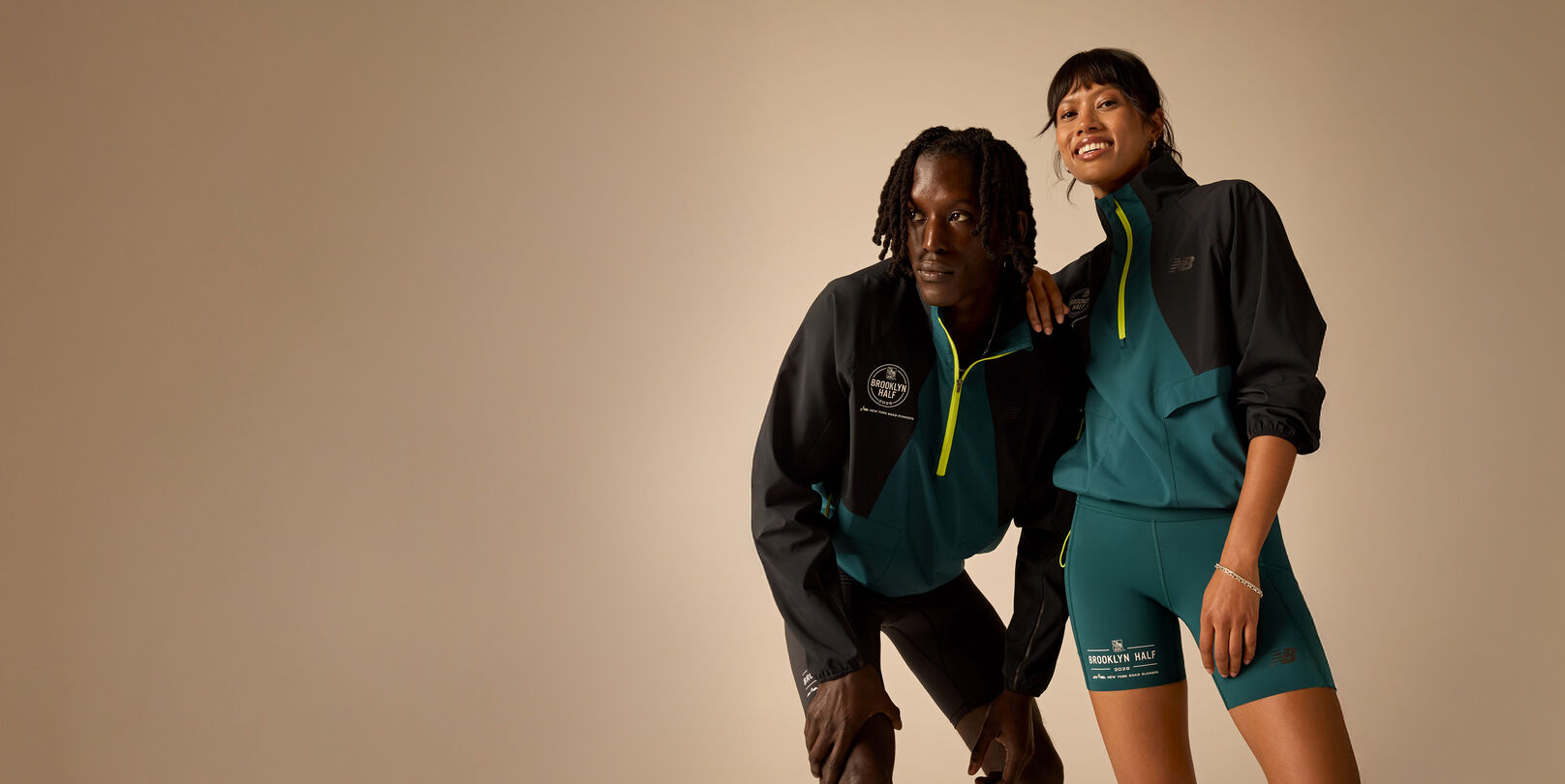 Two people wearing RBC Brooklyn Half Collection apparel in studio. &nbsp;