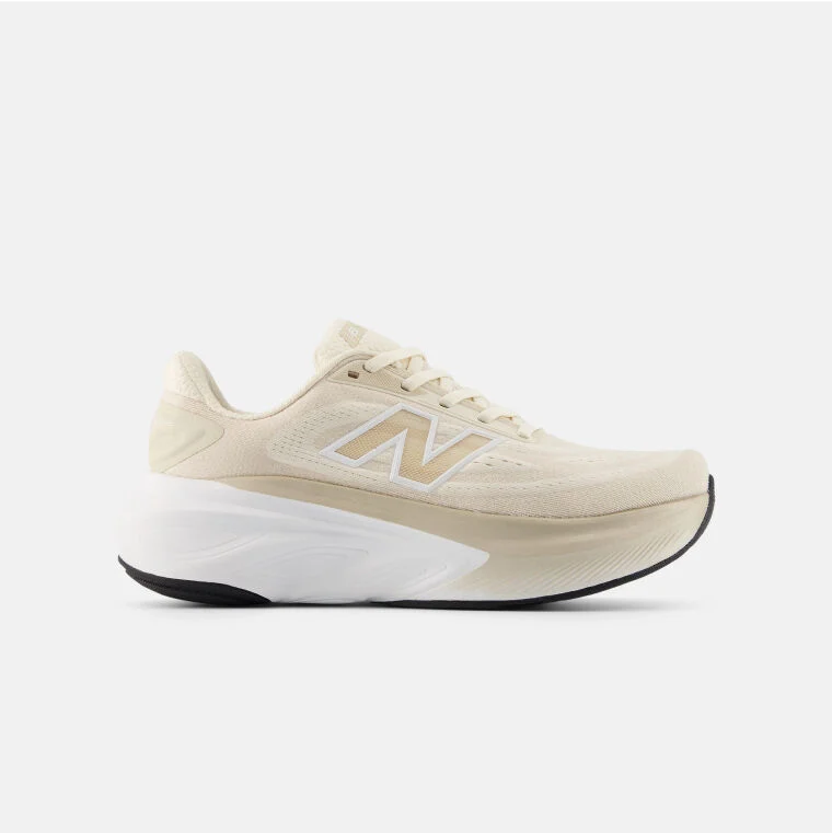 Cream running shoes with a white outsole.