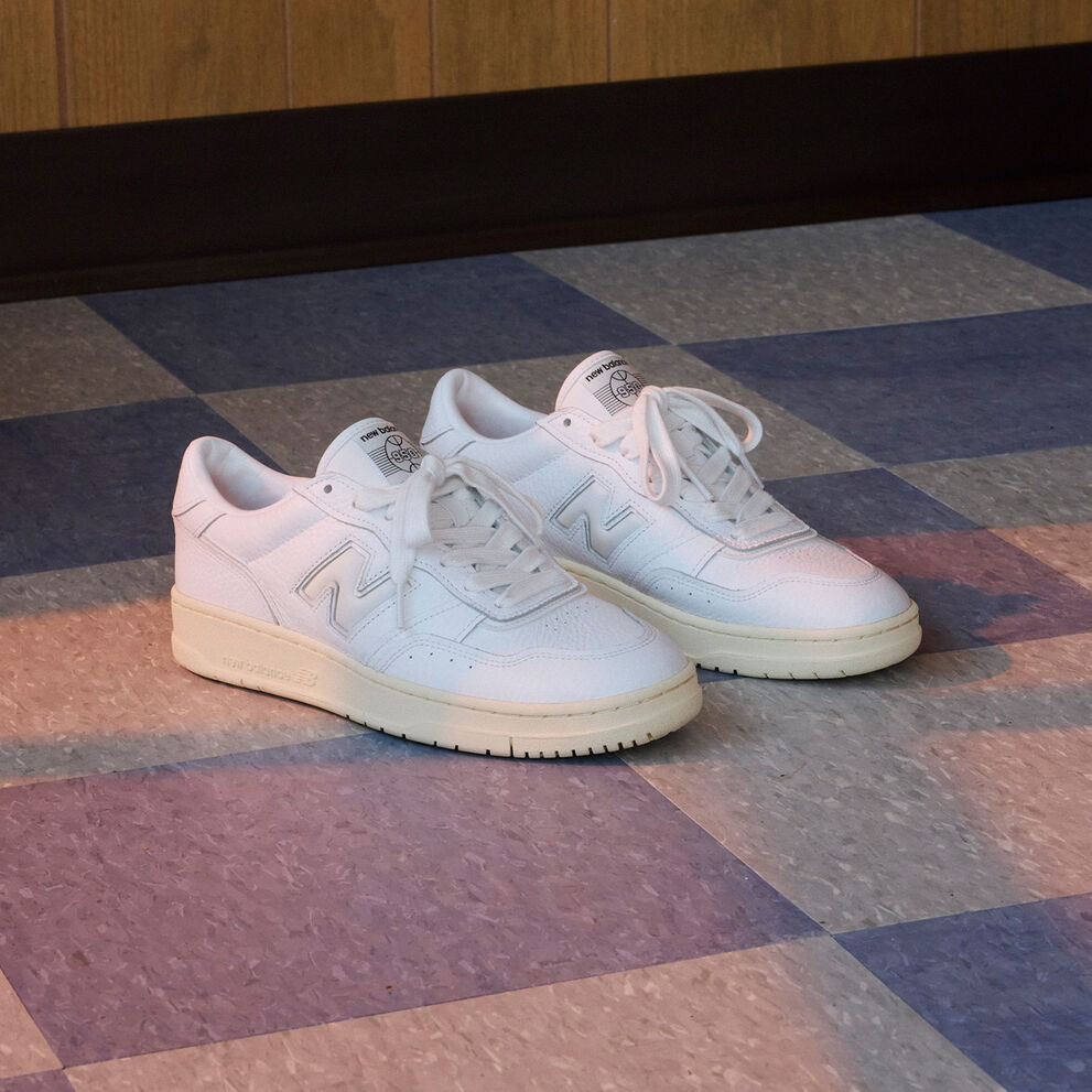 White pair of 950s on a tile floor