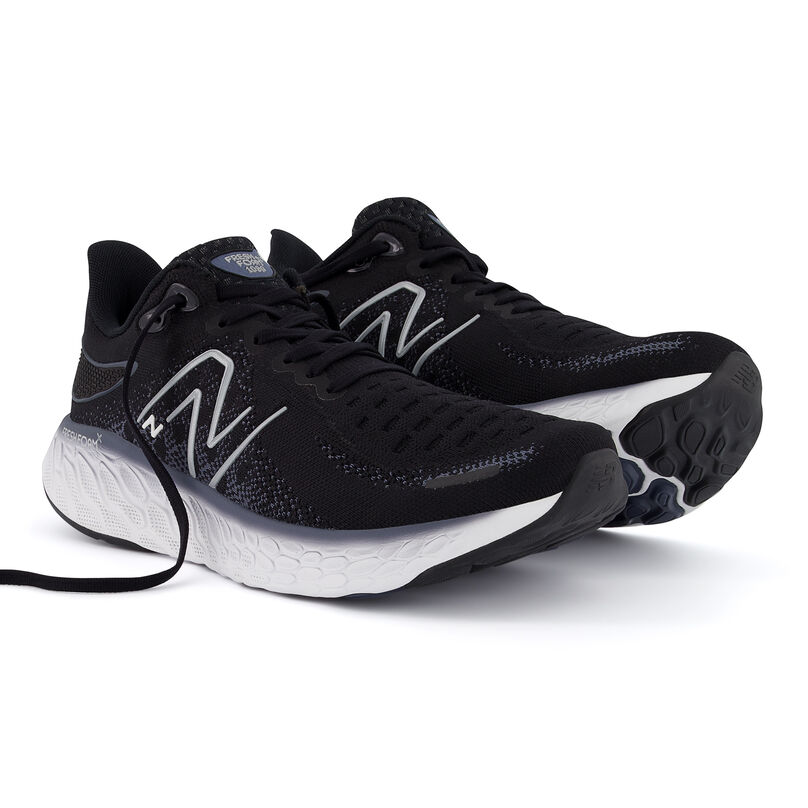 Pair of running shoe sitting at an angle together.