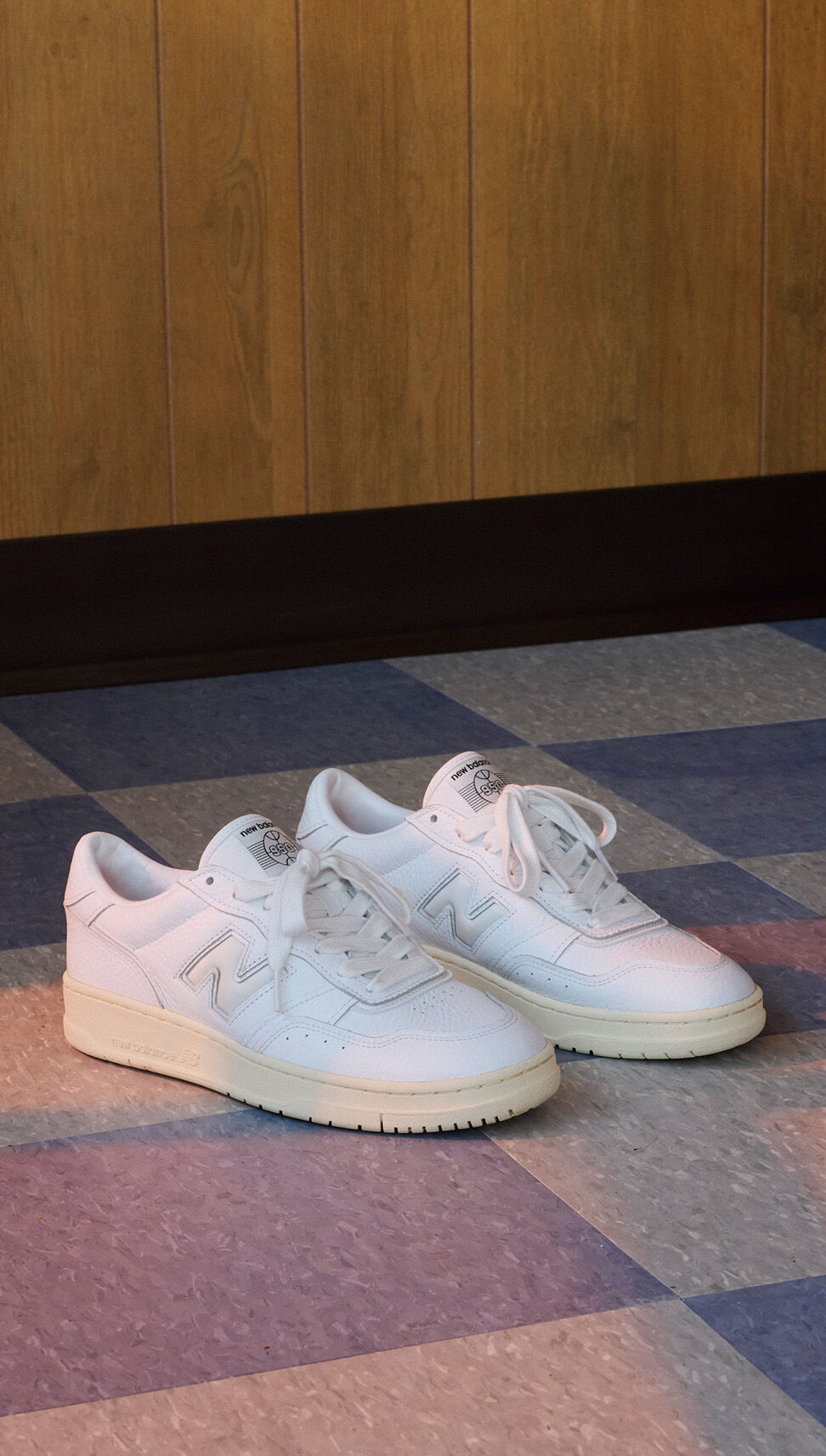 White pair of 950s on a tile floor