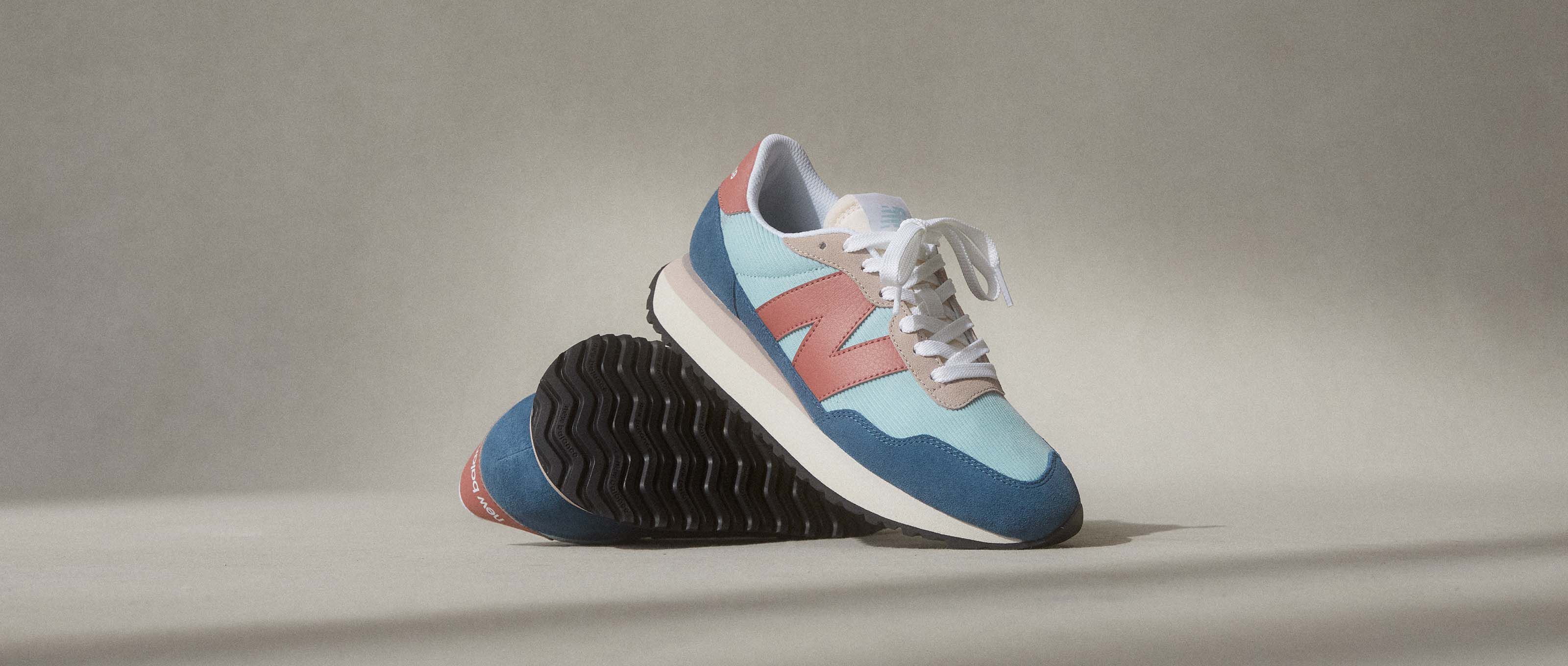 new balance 620 grey pink green