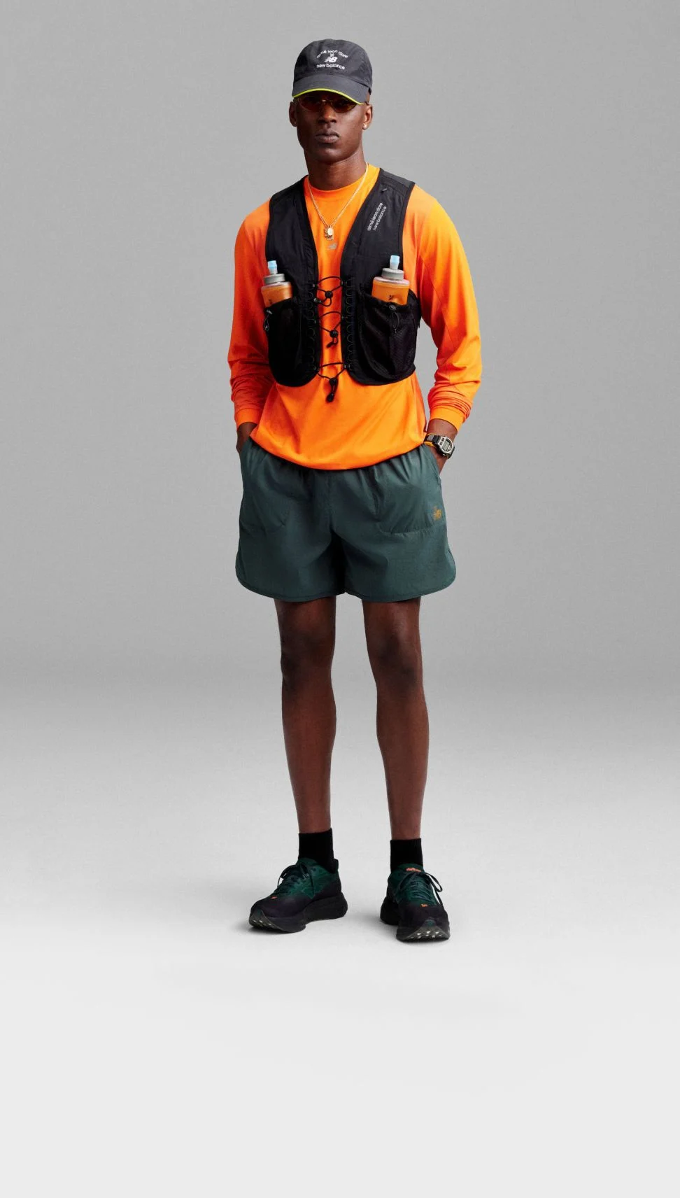 Person wearing Aim&eacute; Leon Dore / New Balance SC Elite shoes.