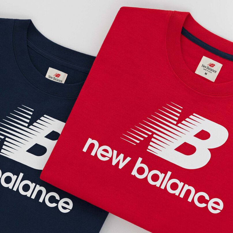 Two folded MADE in USA t-shirts stacked on top of each other.