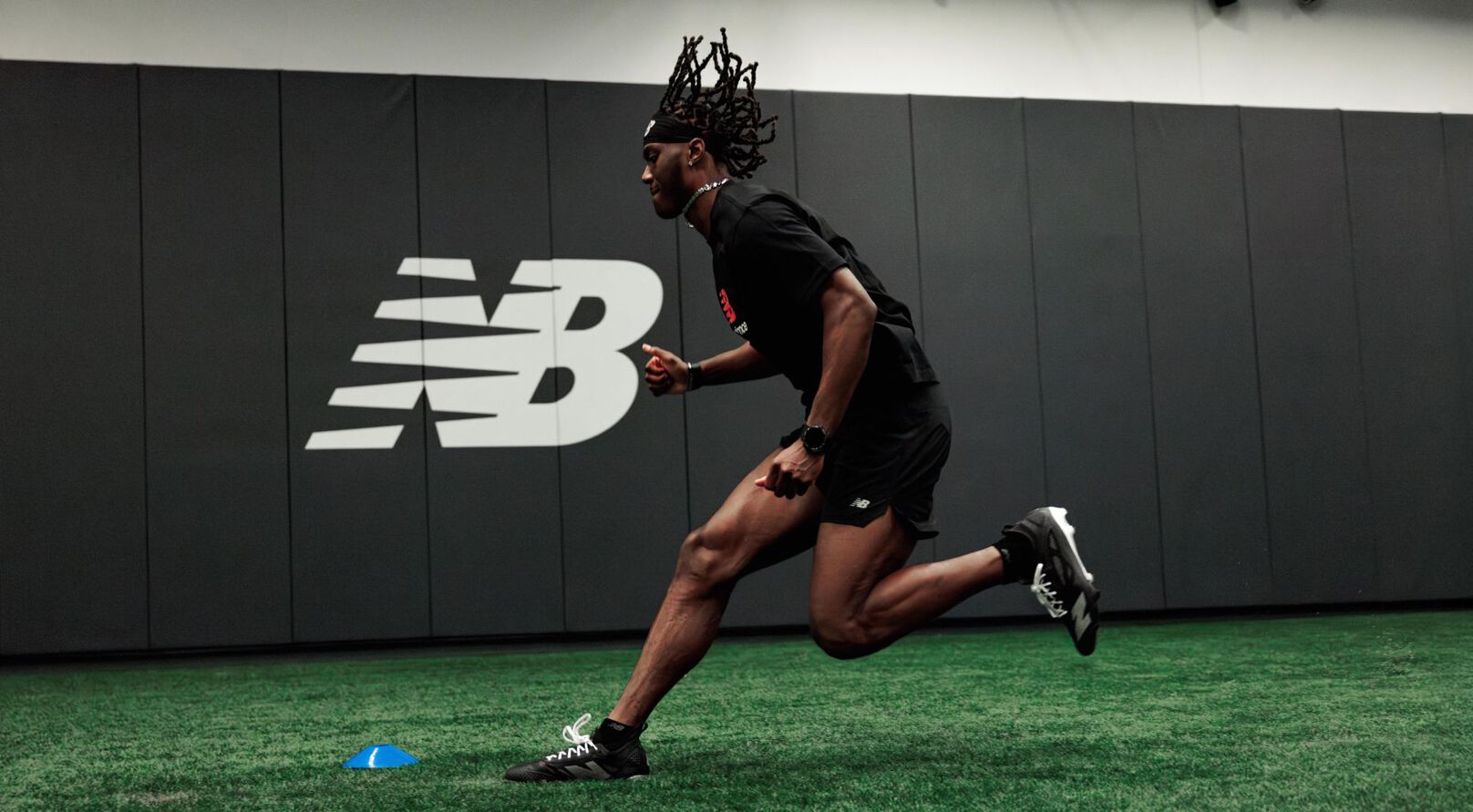 Marvin Harrison Jr running on turf.