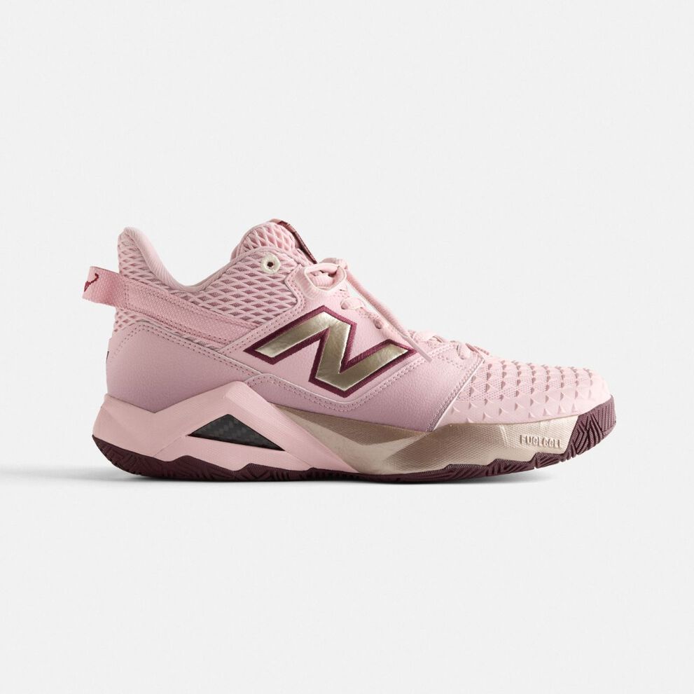  One CG2 shoes on a grey background.