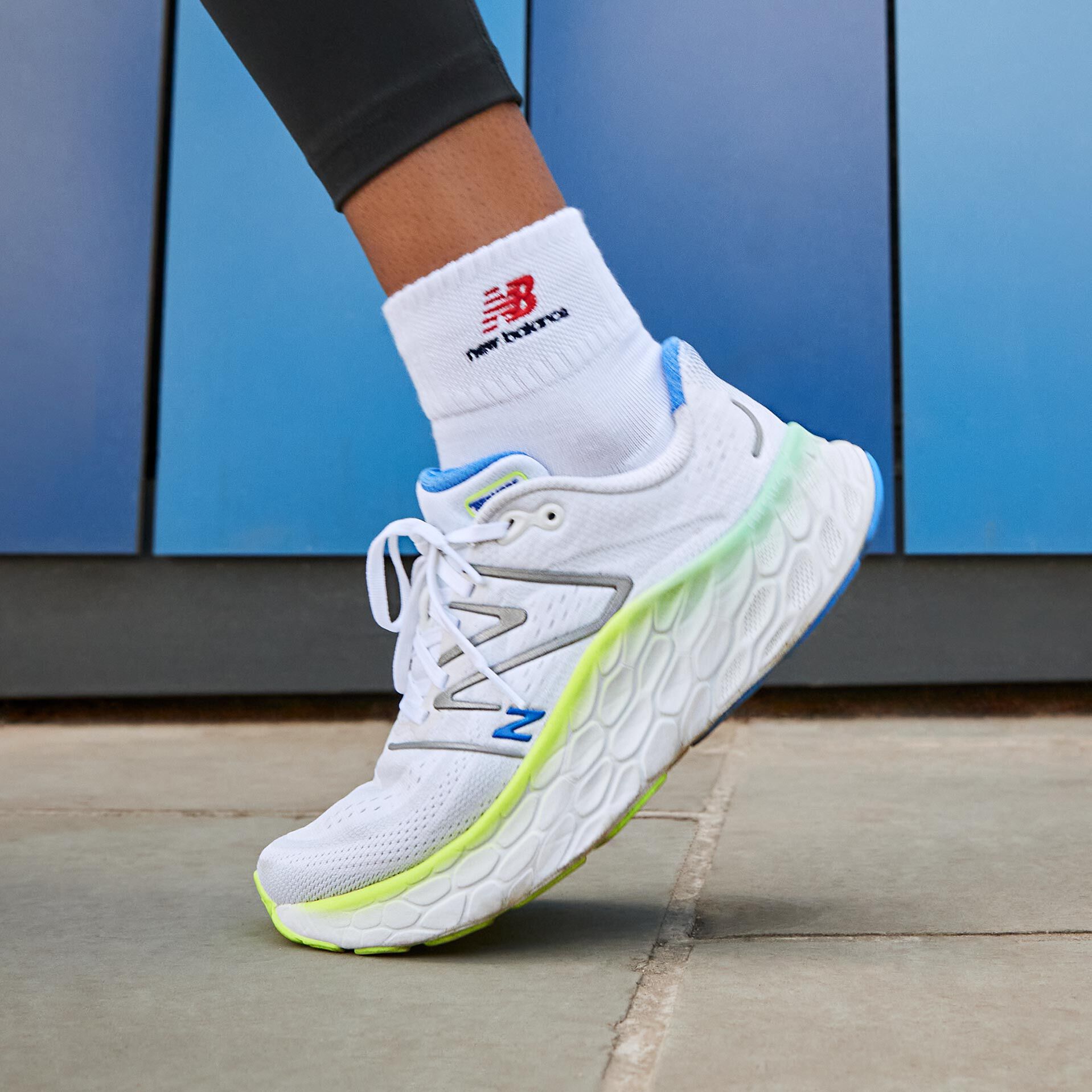 Person walking in women’s Fresh Foam More v4 shoe.