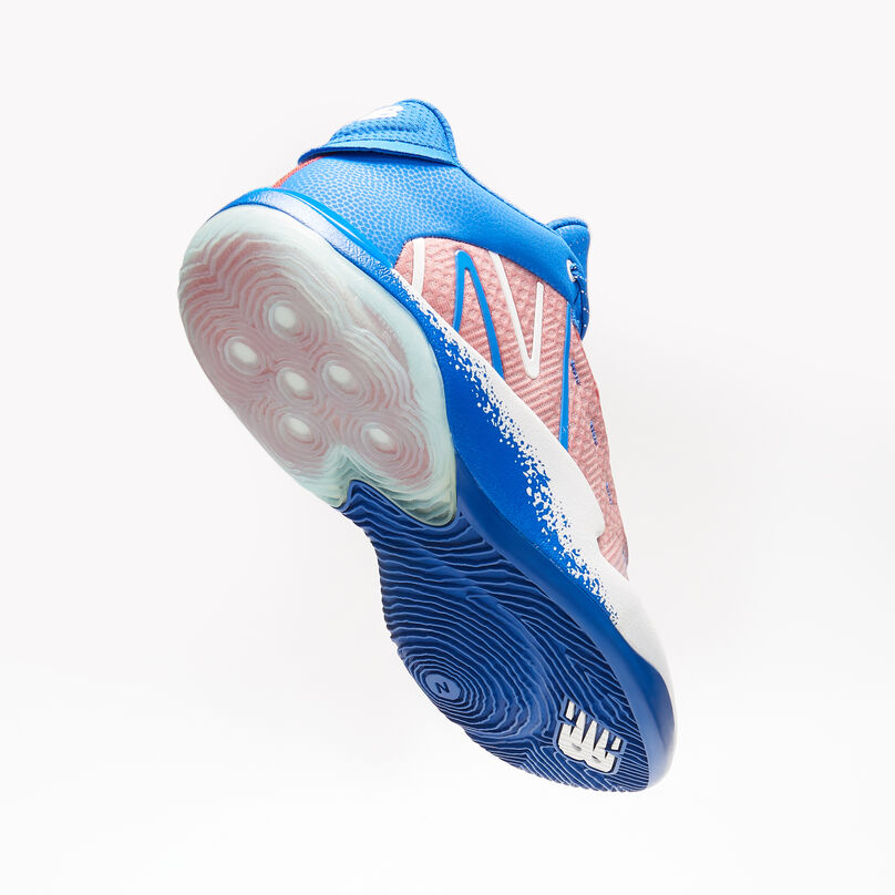 Floating red, white, and blue basketball shoe.