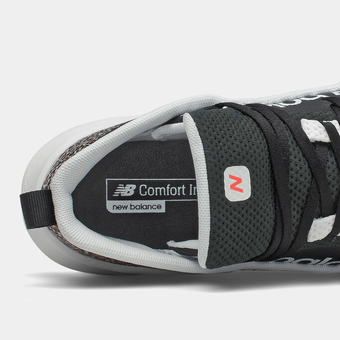Top down view of the inside of the shoe and the tongue.