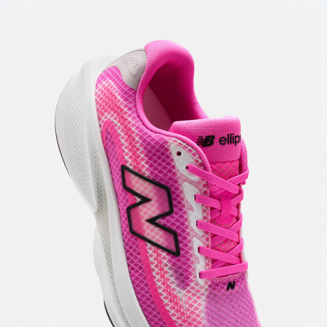 Single pink running shoe on a white background