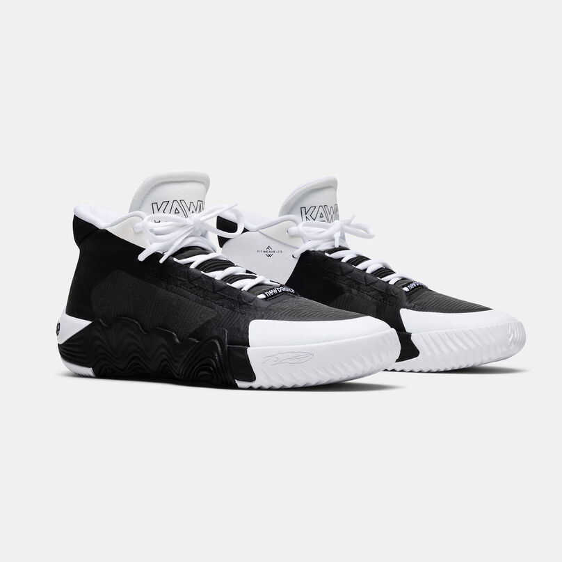 Pair of white band black basketball shoes facing to the right on a grey background.